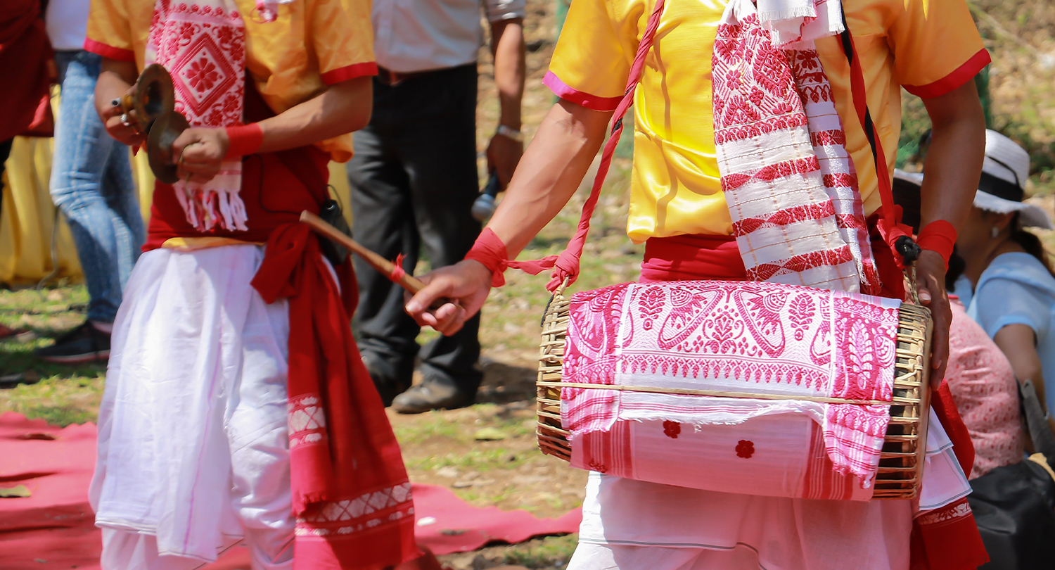 Traditional Assamese cultural program featuring Bihu dance, Naam Kirtan, Bhagawat Path, cultural stage shows, and folk music by Kahuwa Pallab Creation, founded by Singer, Lyricist and Composer Pallab Das.